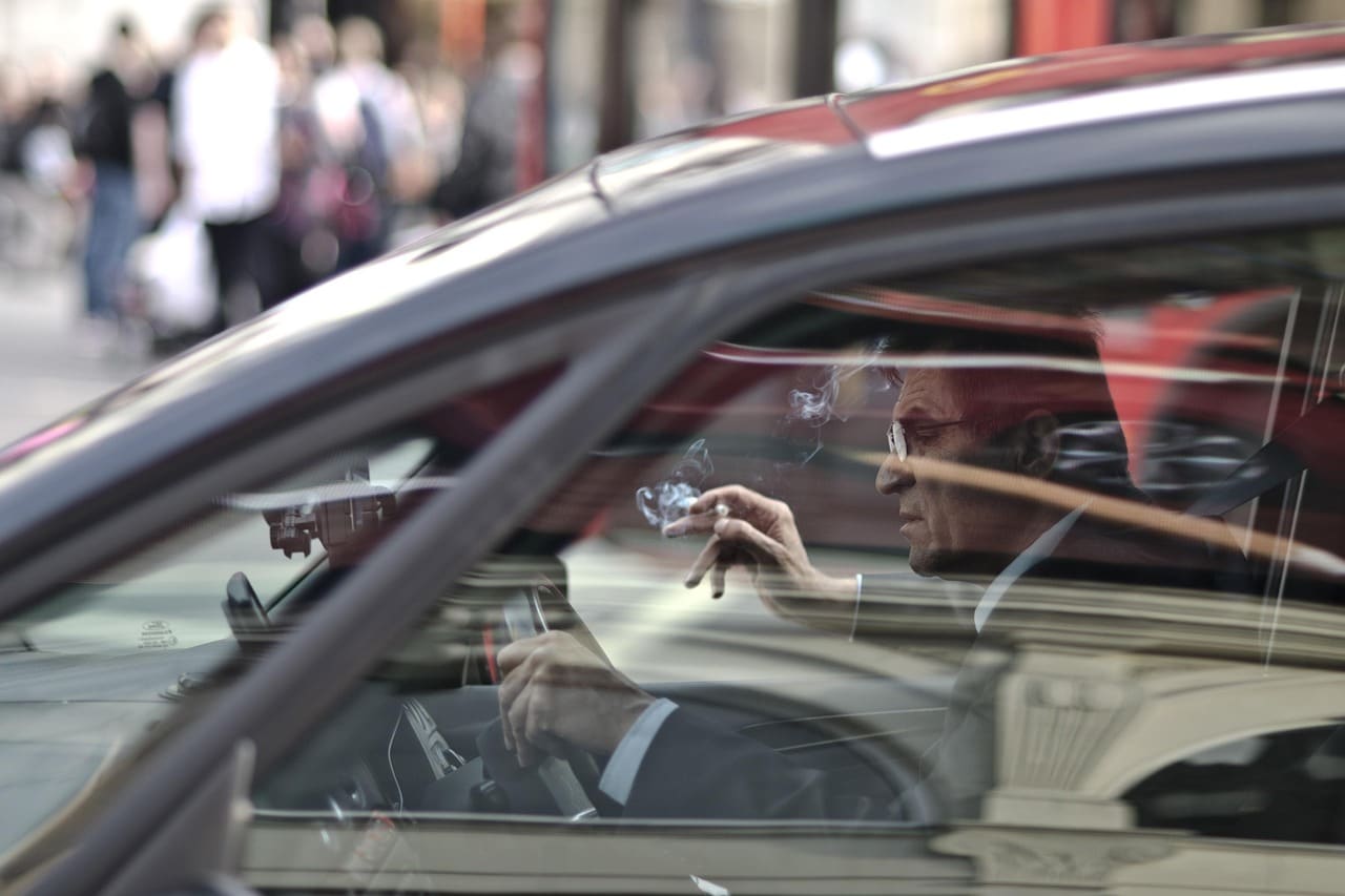 young driver reviewing car insurance quote